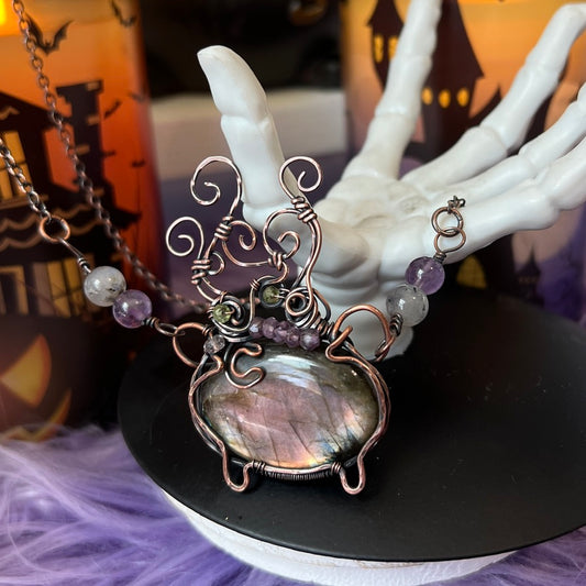 Handmade cauldron pendant with Labradorite, Amethyst, Peridot, and crescent moon accent wrapped in copper – witchy necklace