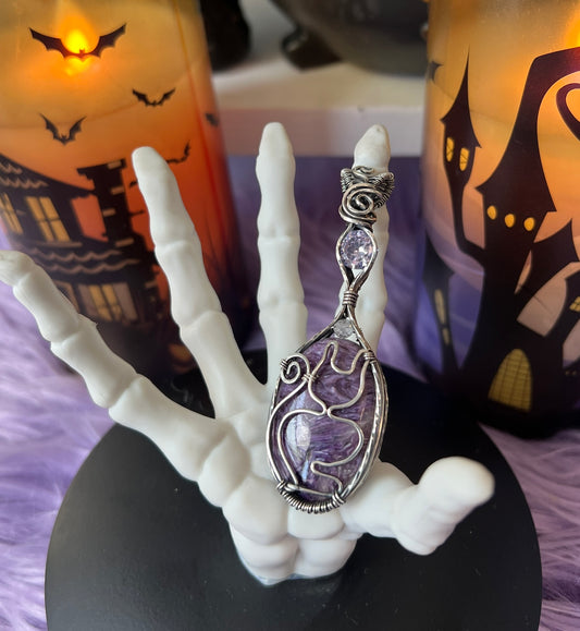 Handmade Charoite cat silhouette pendant wrapped in oxidized sterling silver with lavender CZ accent – witchy familiar necklace