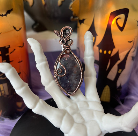Handmade Bloodshot Iolite pendant with Sunstone bead accents wrapped in copper wire – witchy necklace for balance and intuition