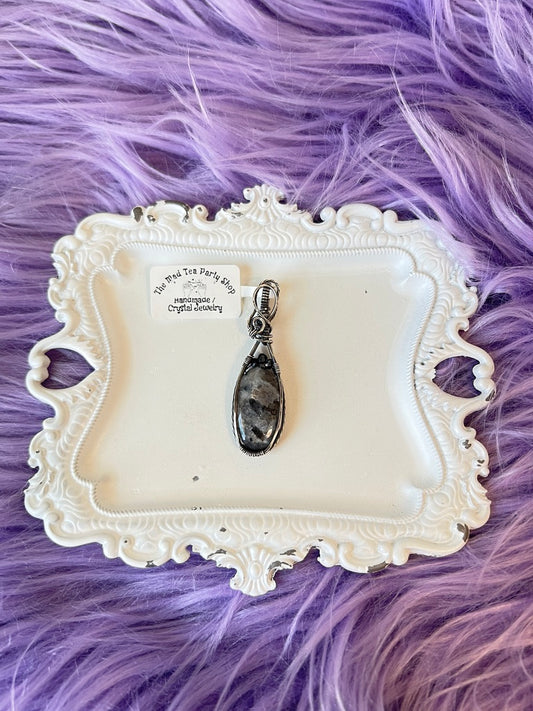 โHandmade larvikite pendant wrapped in oxidized silver with hematite beads