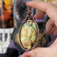 Handmade Labradorite pendant with golden green flash and hammered copper moon detail – witchy necklace