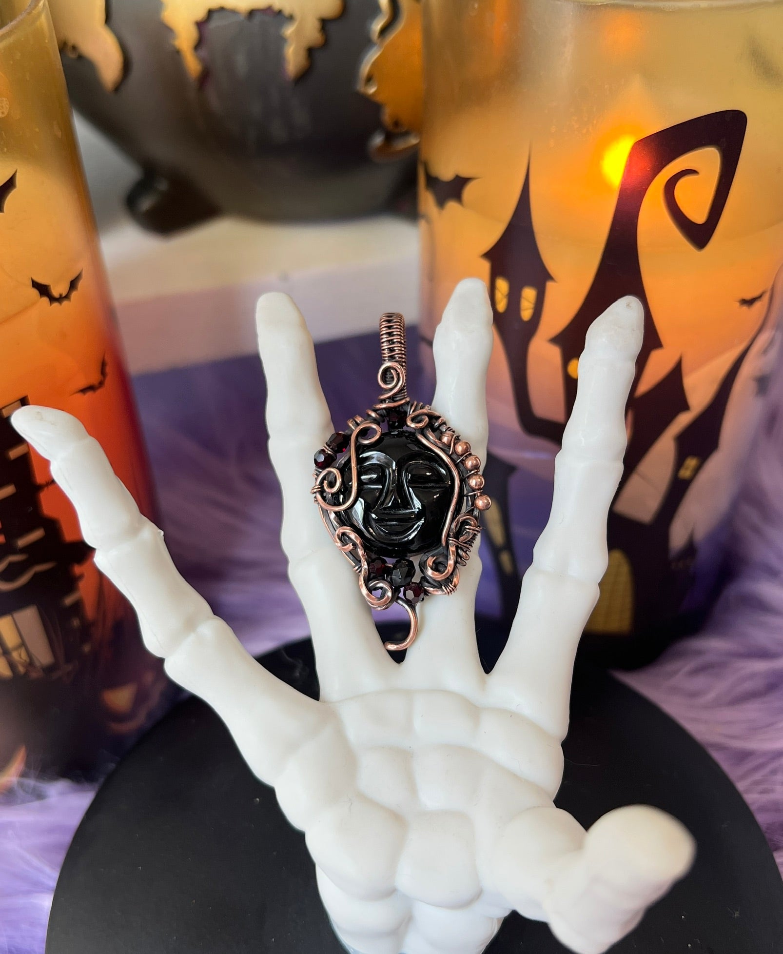 Handmade Black Onyx moon face pendant with Garnet accents and copper wire wrapping – witchy necklace for protection and power
